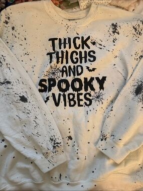 Gildan White Sweatshirt with Black Splatter "Thick Thighs and Spooky Vibes"